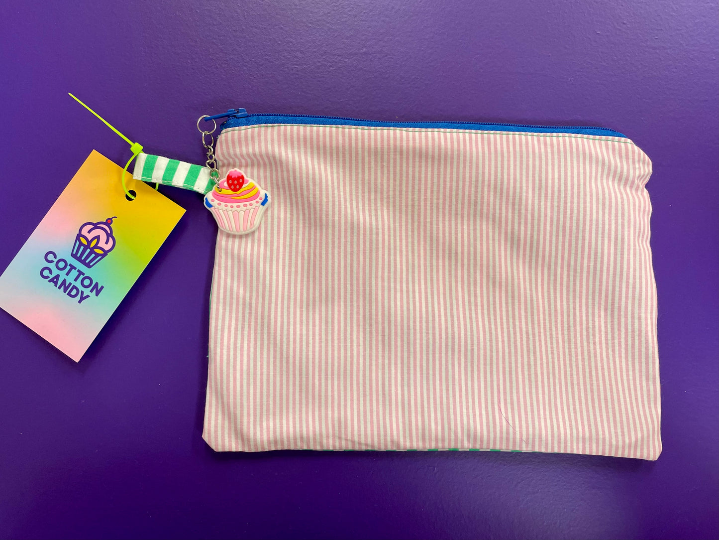 Striped green-pink pouch